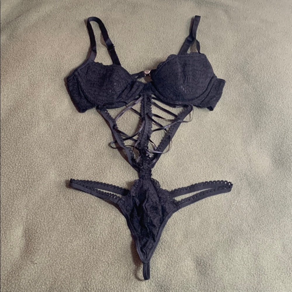 The Escante Collection sexy black lace bodysuit.  Never worn. Size S/M